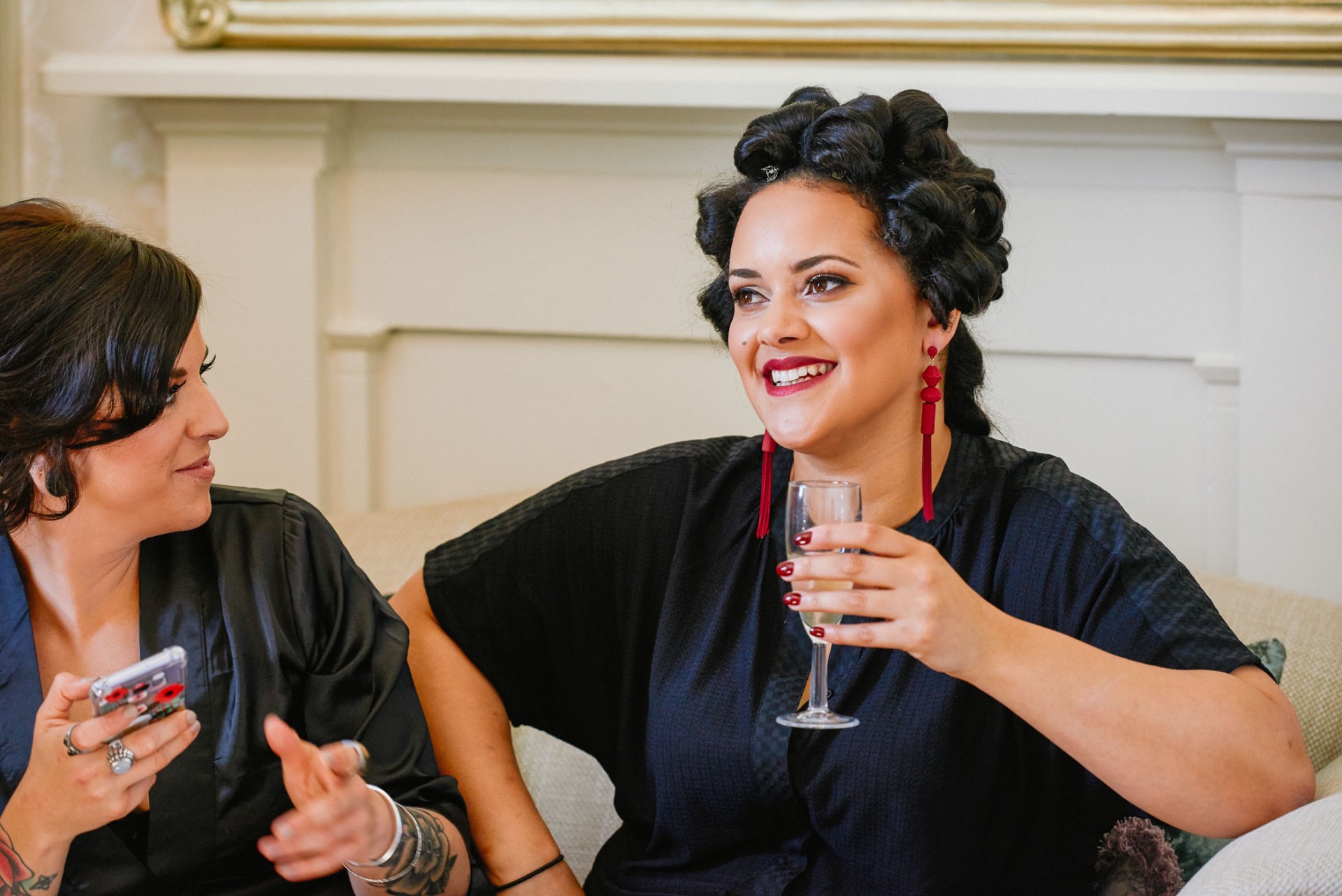 bride with her hair in rollers during bridal prep