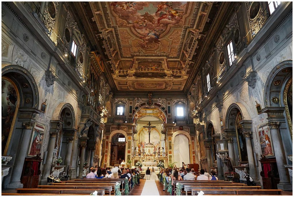 Wide shot of wedding ceremony at Ognissanti Church in Florence