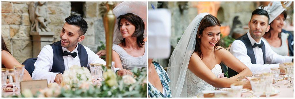 Bride and groom laughing during speeches at Castello Di Vincigliata destination wedding