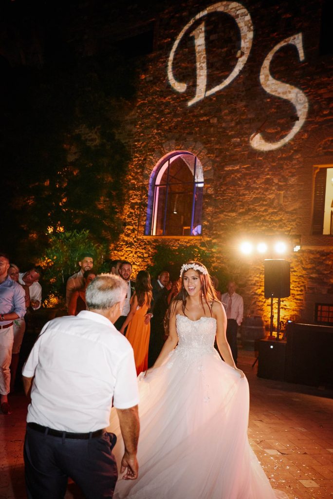 Bride dancing with her dad at Castello Di Vincigliata