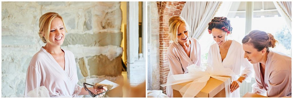 Bride and bridesmaids getting ready and opening wedding boxes at Villa le Fontanelle in Florence, Italy