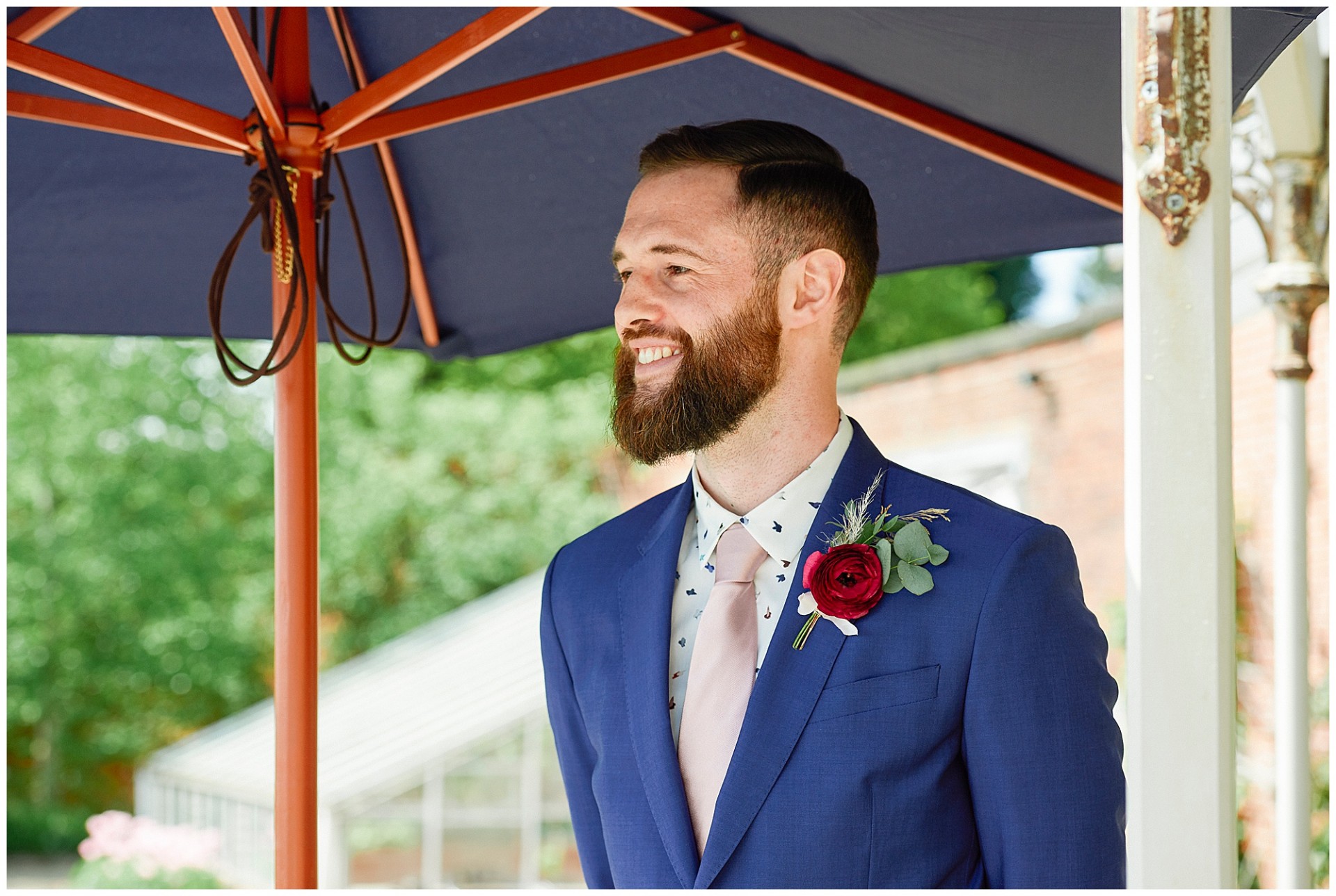 Groom waiting at outdoor alter at the Walled Garden in Nottingham.