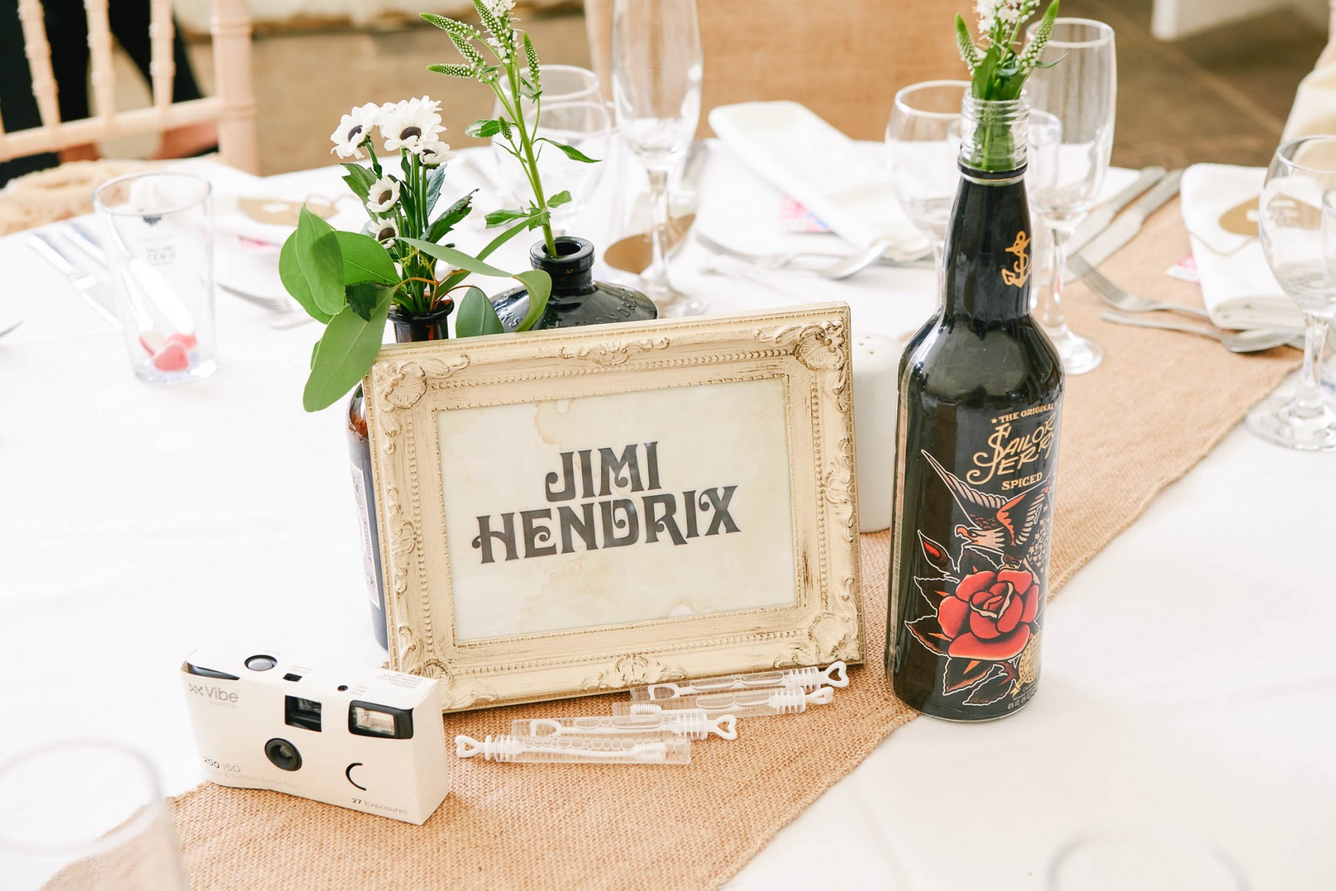 rock n roll inspired table name in a frame saying Jimi Hendrix at The Peasantry Brewery
