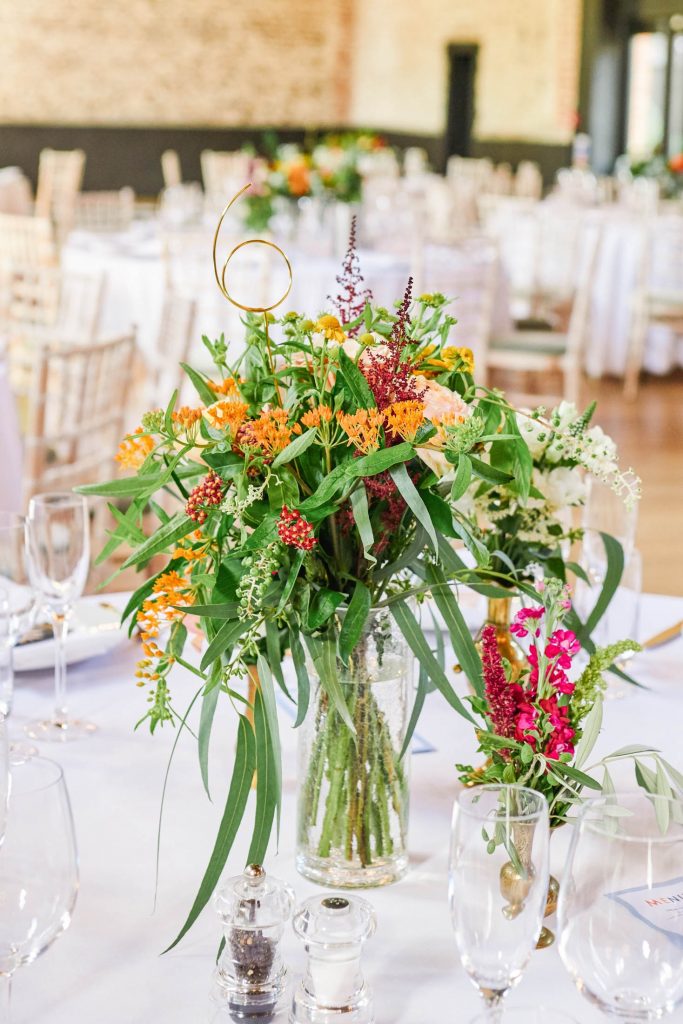 Wedding flowers on white wedding table