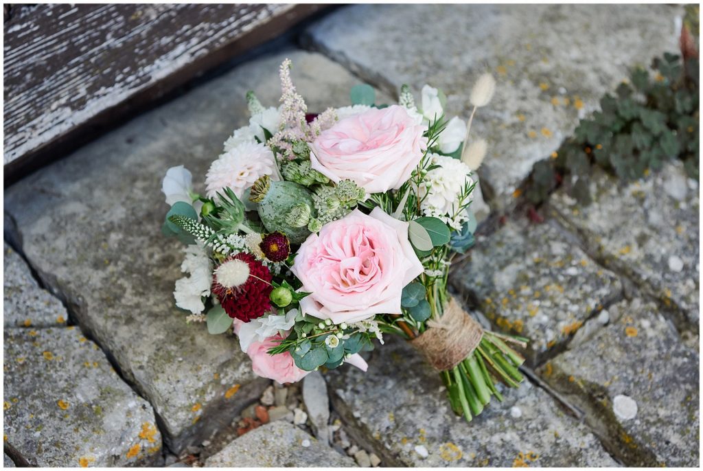 Flower bouquet on stone floor