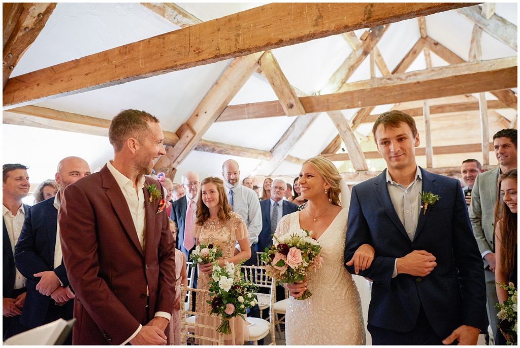 Excited Bride and groom seeing each other during their relaxed wedding