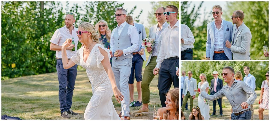 bride and guests wedding guests playing English fete games during outdoor summer wedding.