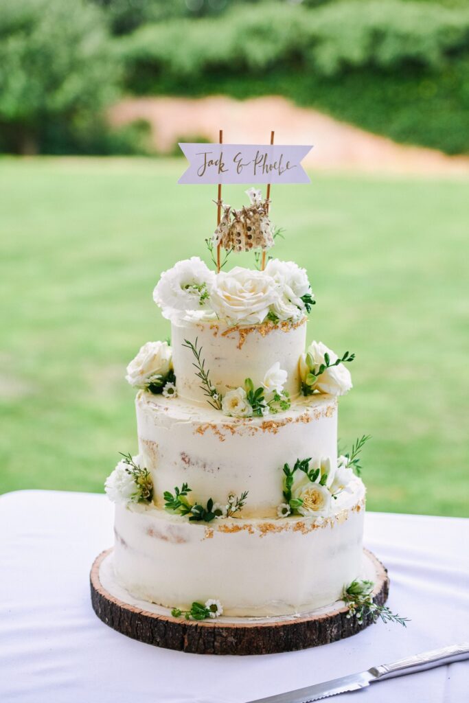 beautiful wedding cake at a summer festival wedding 