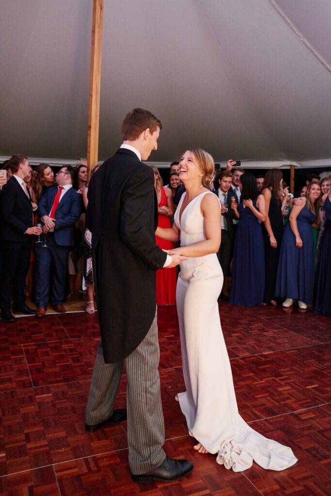 Wedding couple dancing during evening marquee reception at Pamber Place
