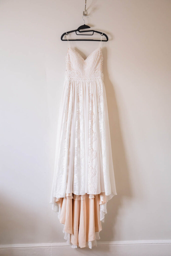 wedding dress hanging in bridal suite at woodborough hall