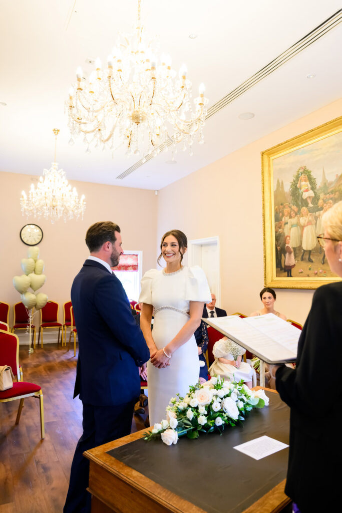 Bride & groom smiling during West Bridgford Registry Office wedding