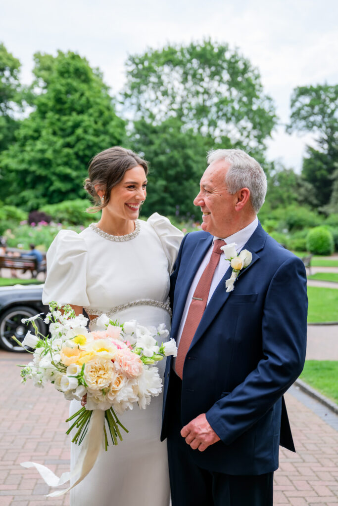 Bride with her father outside West Bridgford Registry Office before the ceremony