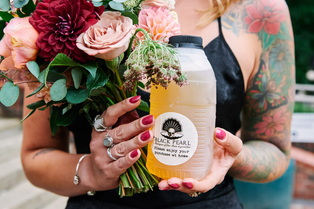 Close-up of wedding drinks and bouquet during an alternative Nottingham wedding