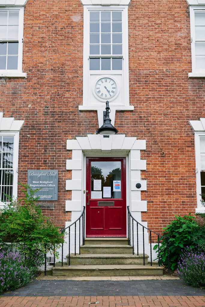 Exterior of West Bridgford Registry Office in Nottingham with its red door entrance