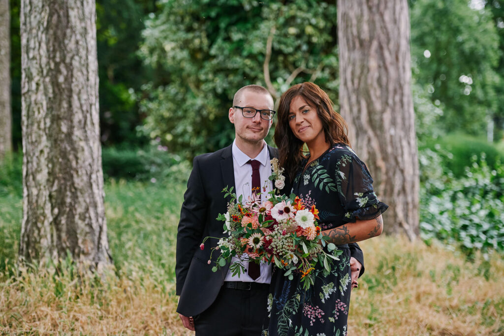 Bride and groom portrait in West Bridgford Park after their registry office wedding