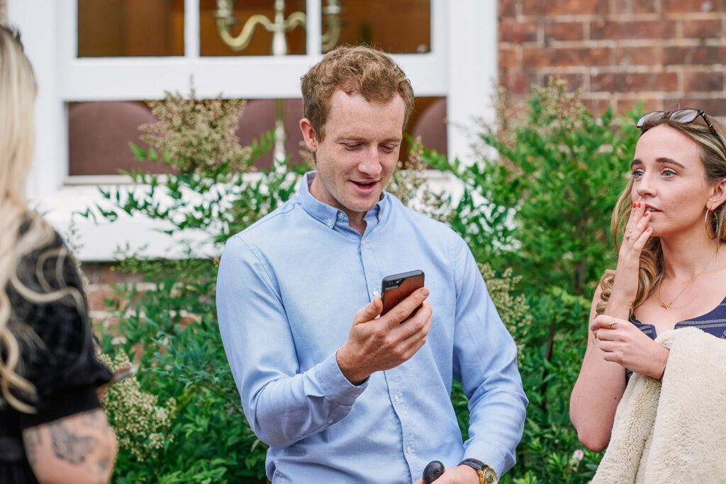 Wedding guests outside a Nottingham registry office during an intimate ceremony
