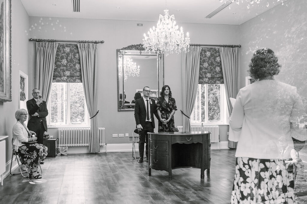 Couple standing during an intimate registry office wedding ceremony in Nottingham
