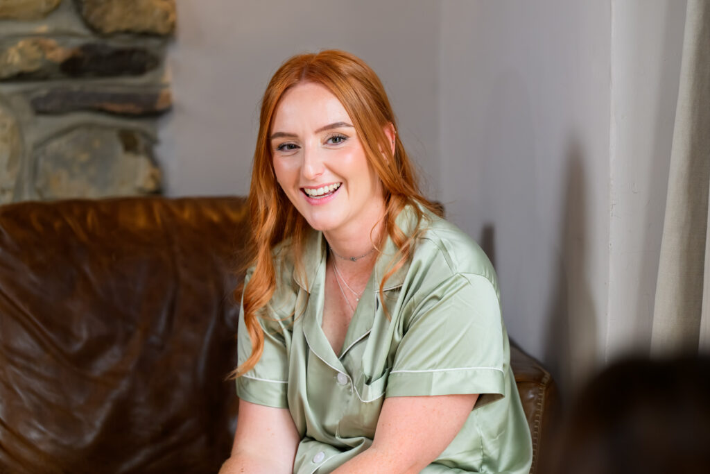 Bridesmaid portrait during relaxed bridal preparations at Willow Marsh Farm wedding venue