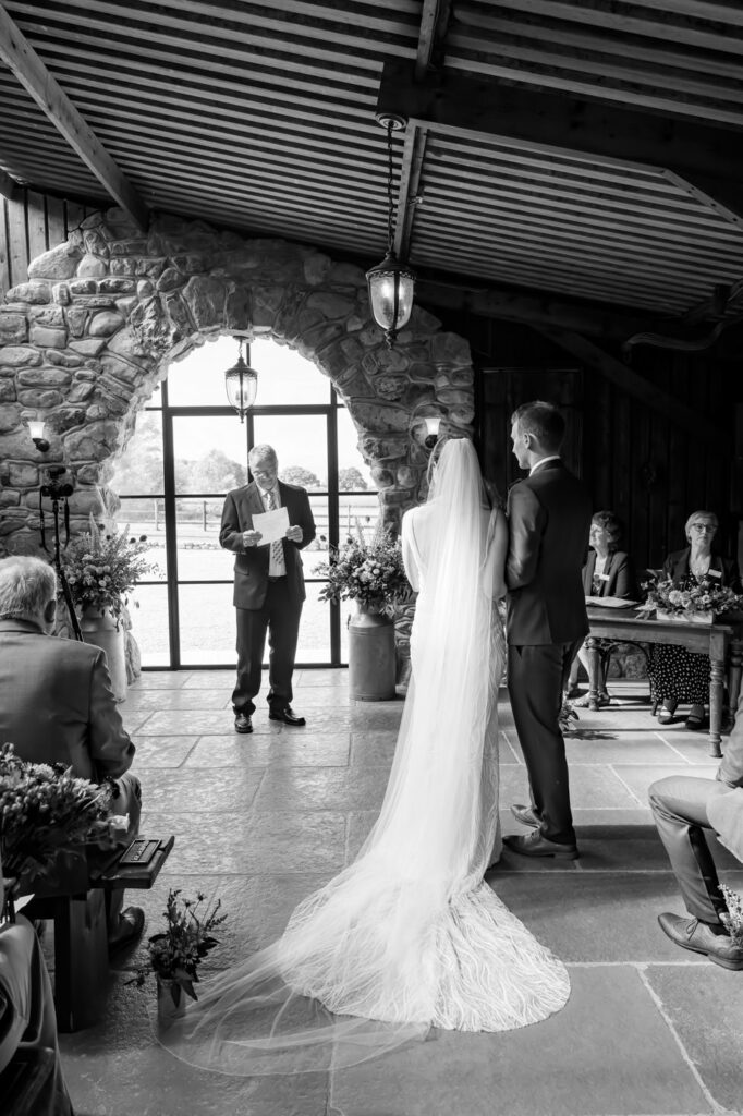Bride and groom standing at the altar during emotional wedding ceremony