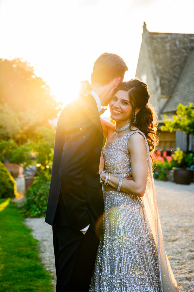 Golden hour wedding photography of the bride and groom in the gardens at Manor by the Lake.