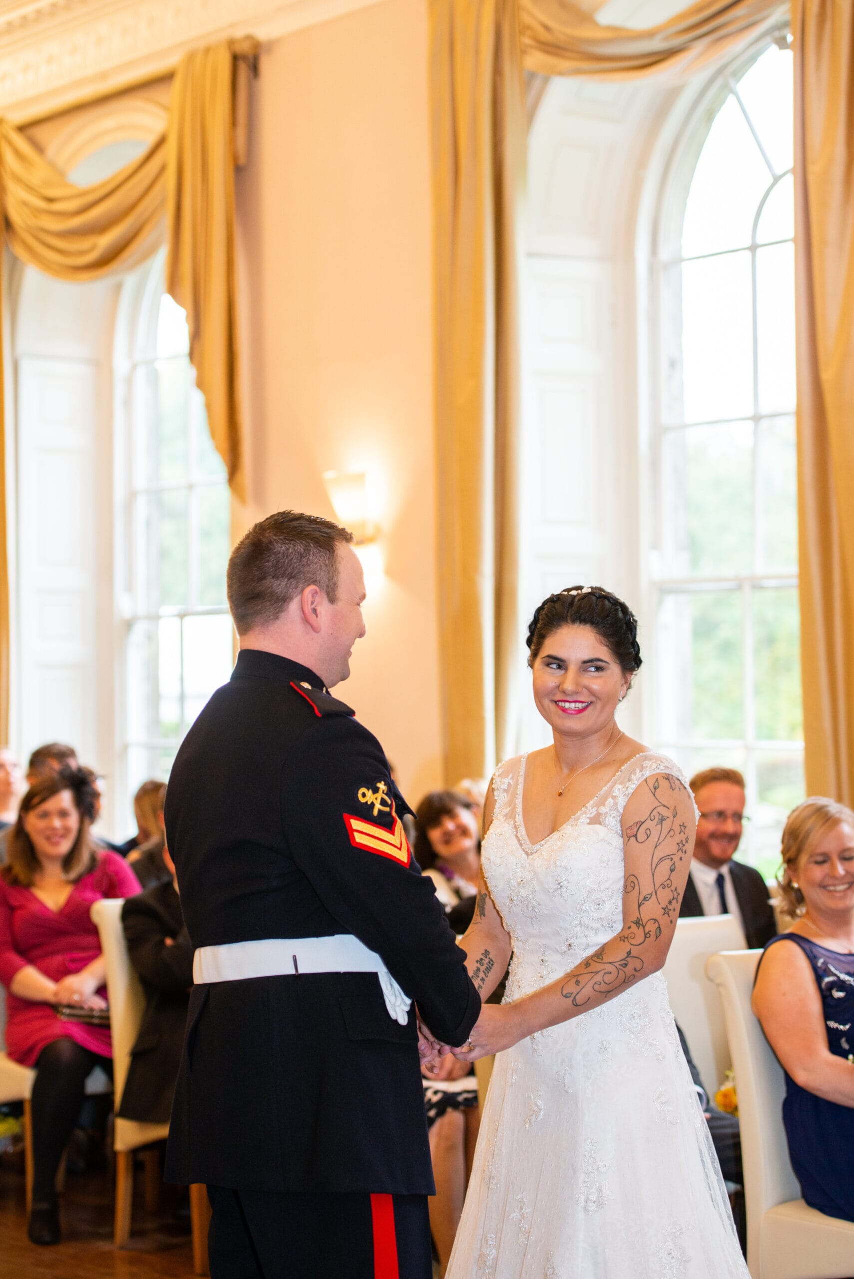 bride & groom during their wedding ceremony in the grand ballroom