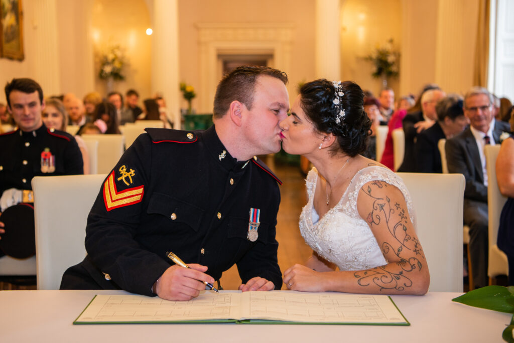 bride & groom kissing during their wedding ay Colwick Hall Hotel
