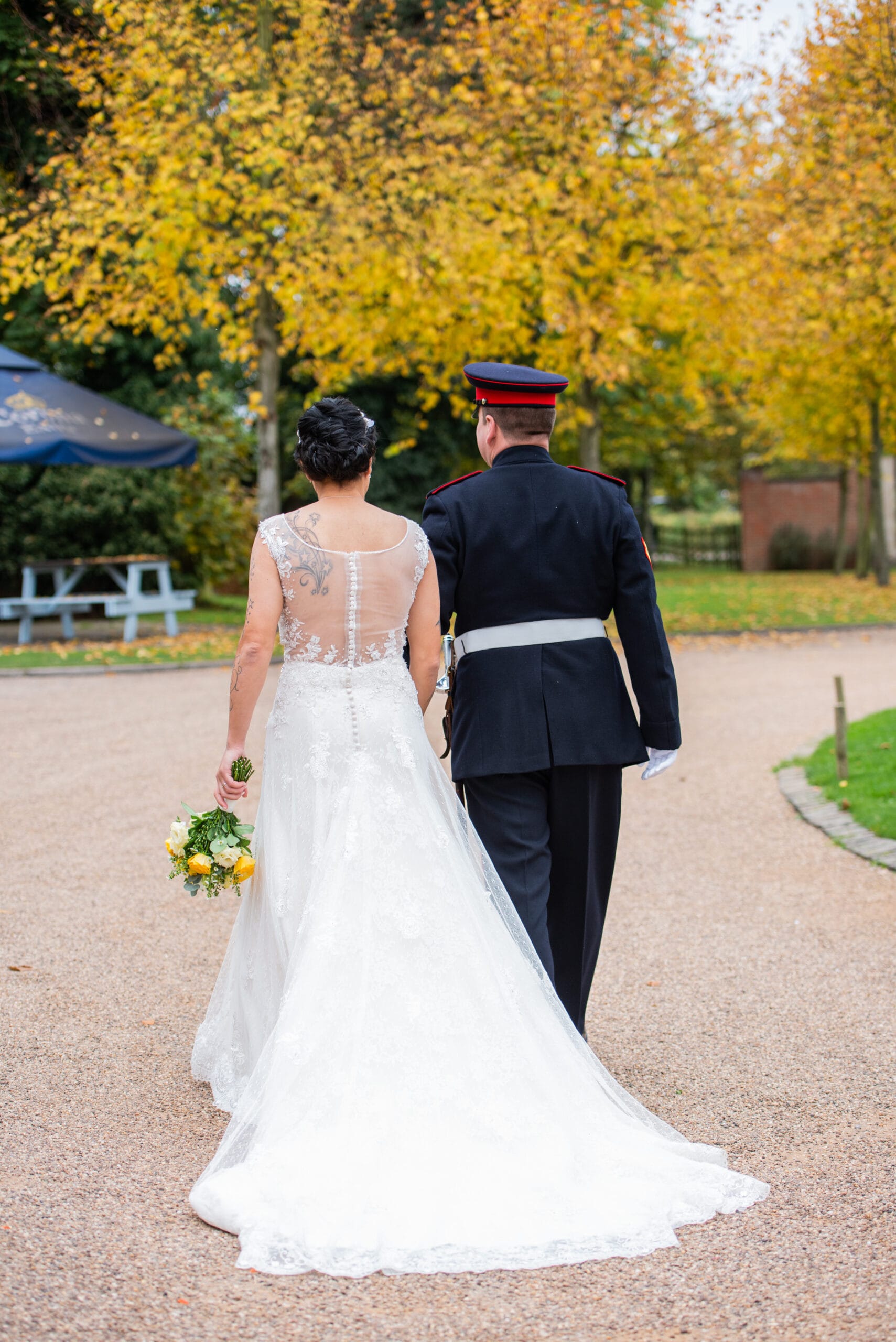wedding couple walking outside together on automnal wedding day