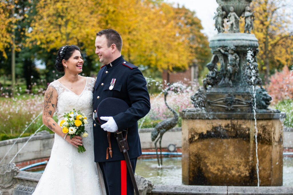 Bride & groom in front of the fountain at Colwick Hall Hotel