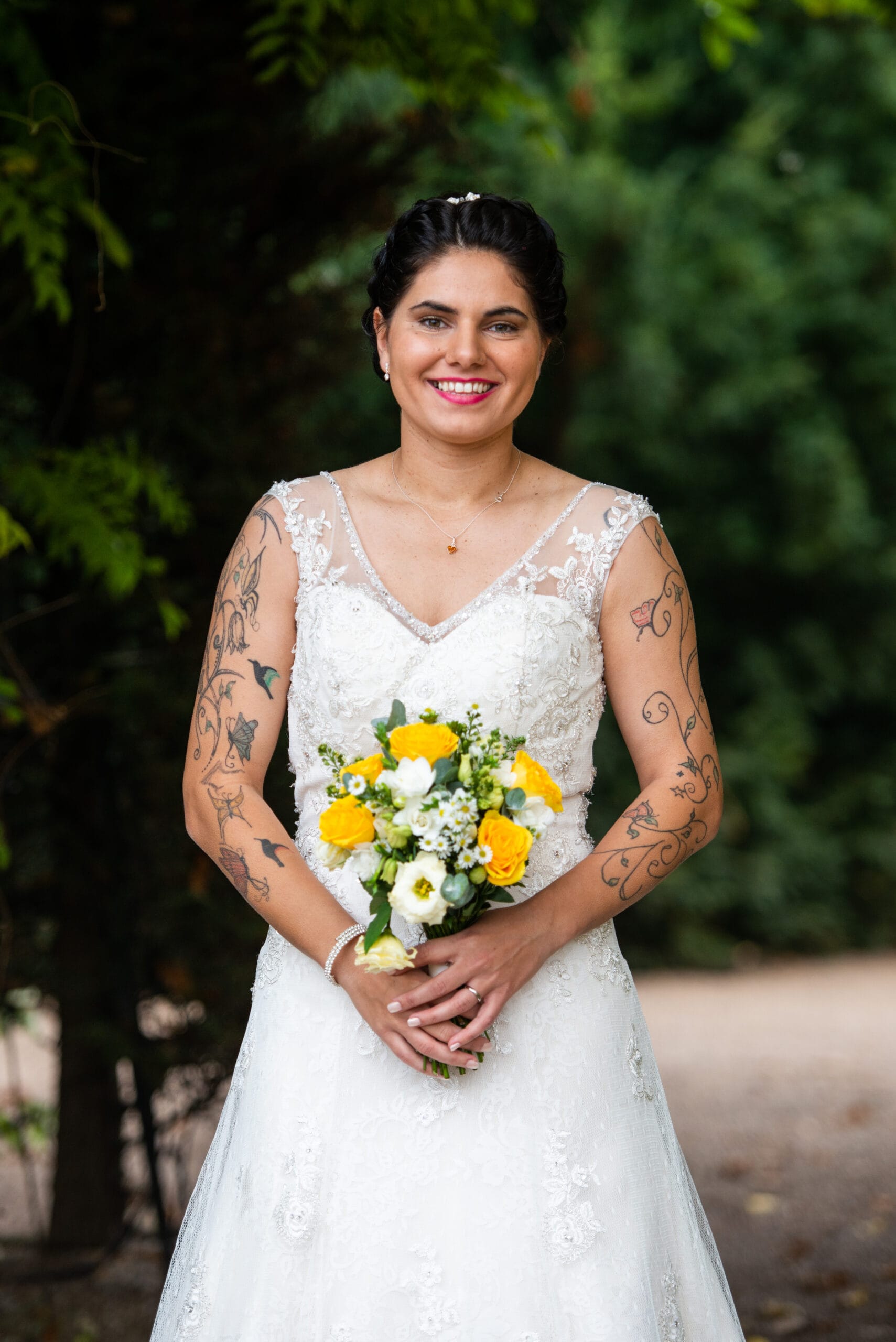 Bride stood outside at Colwick Hall Hotel wedding venue in Nottinghamshire