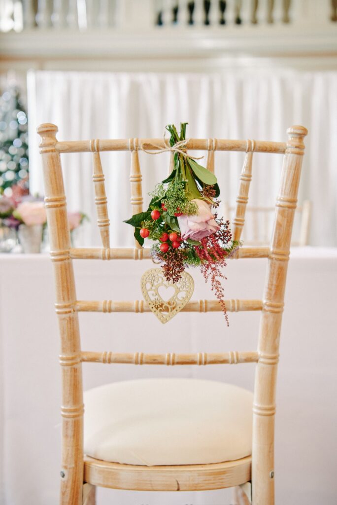flowers hung on wooden chair