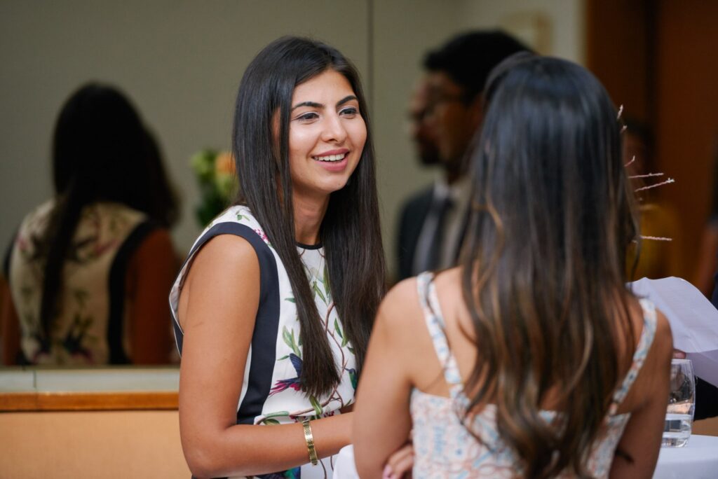 happy wedding guest at the Bluebird in Chelsea, London