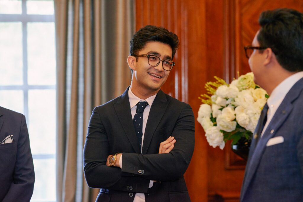 wedding guests laughing during wedding ceremony at Old Marylebone Town Hall