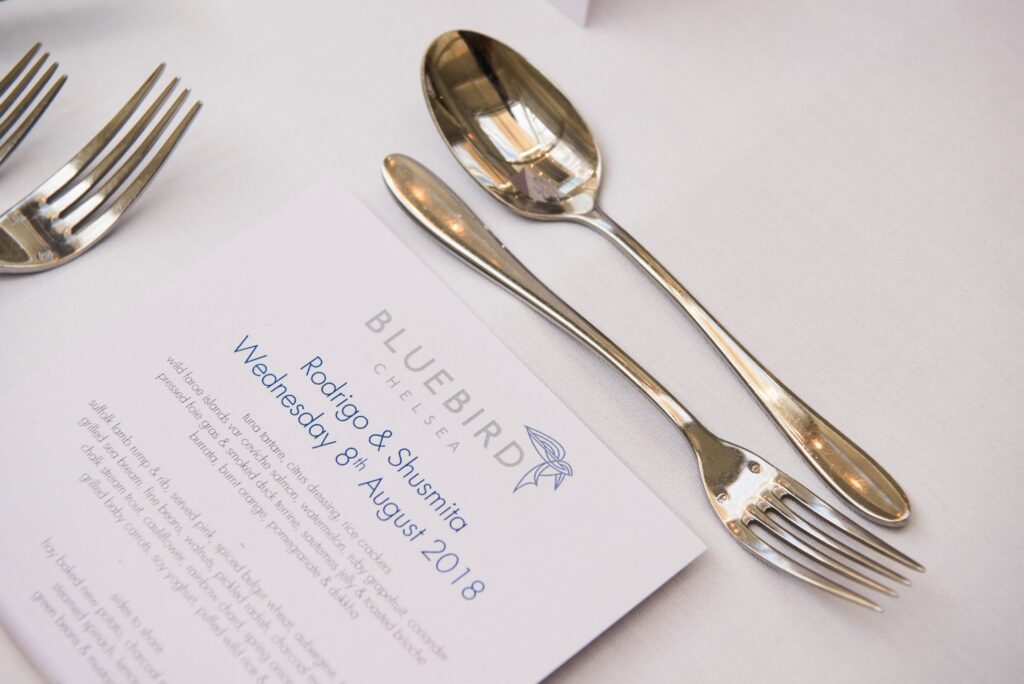 wedding menu on the dinner table at Bluebird in Chelsea, London
