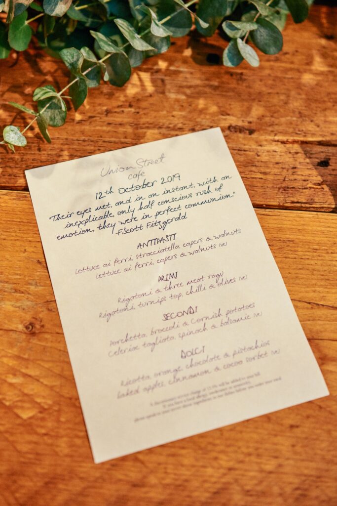 Wedding menu on a wooden table at Union Street Café Wedding Venue