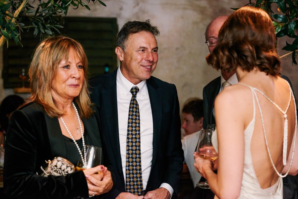 wedding guests laughing during small wedding reception at Union Street Café.