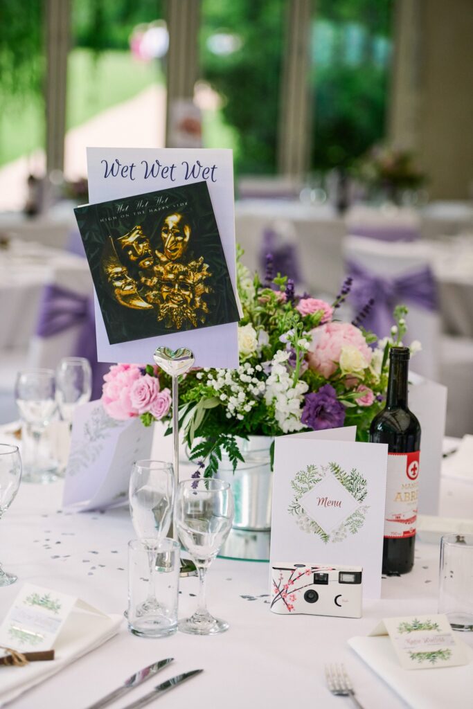 Wet wet wet themed wedding table with music vinyl at Ridge Farm
