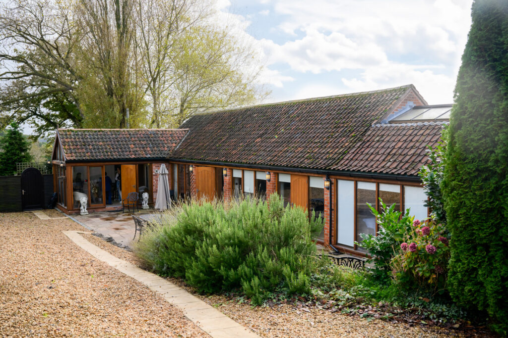 Exterior photography of the Old Stables at Swancar Farm wedding venue