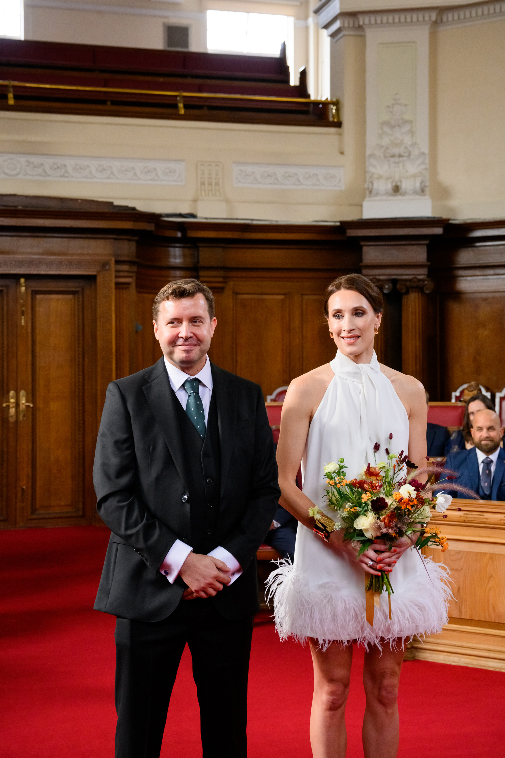 bride and groom smiling during Islington Town Hall wedding ceremony