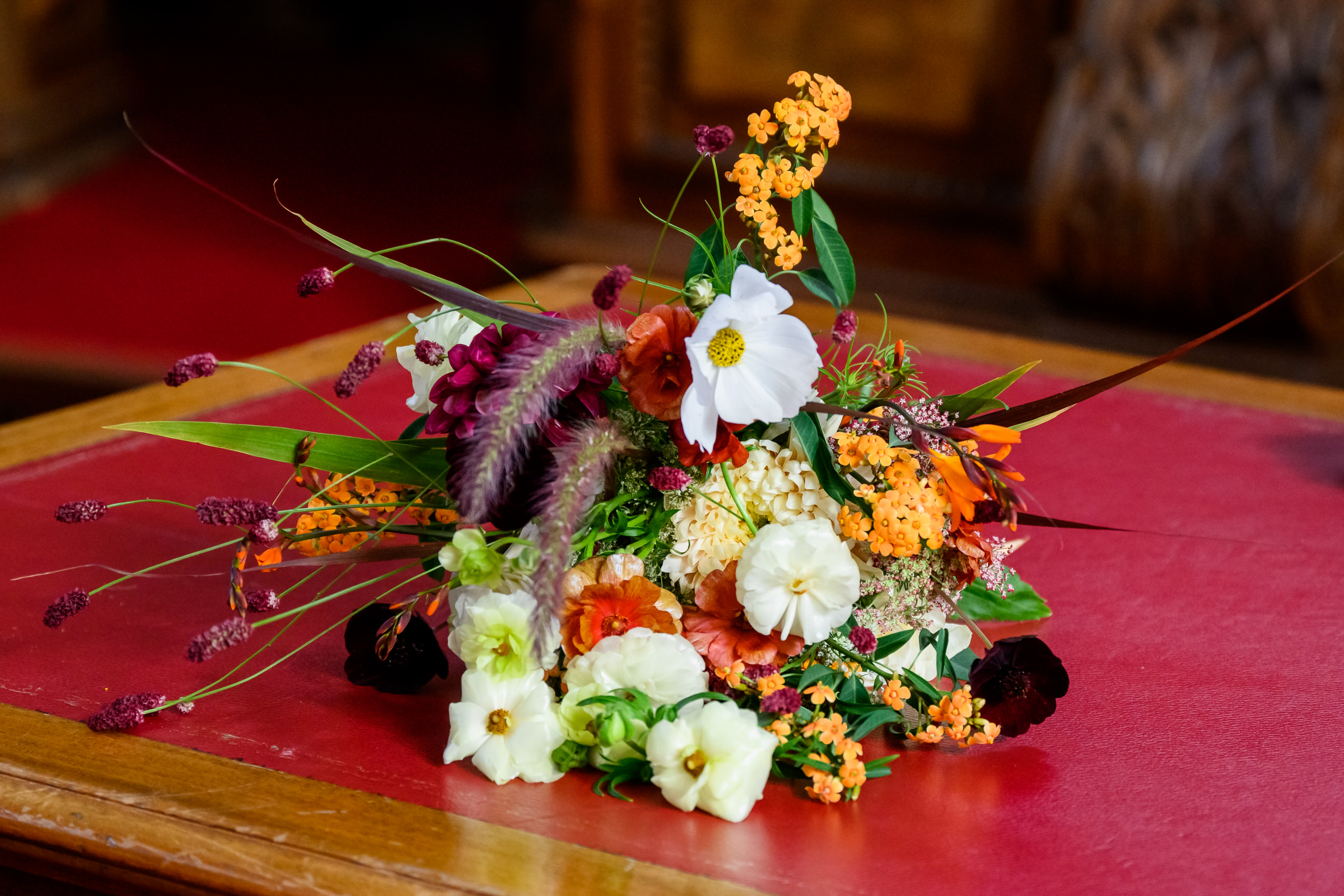 wedding bouquet sat on a table in the chamber room at Islington Town Hall