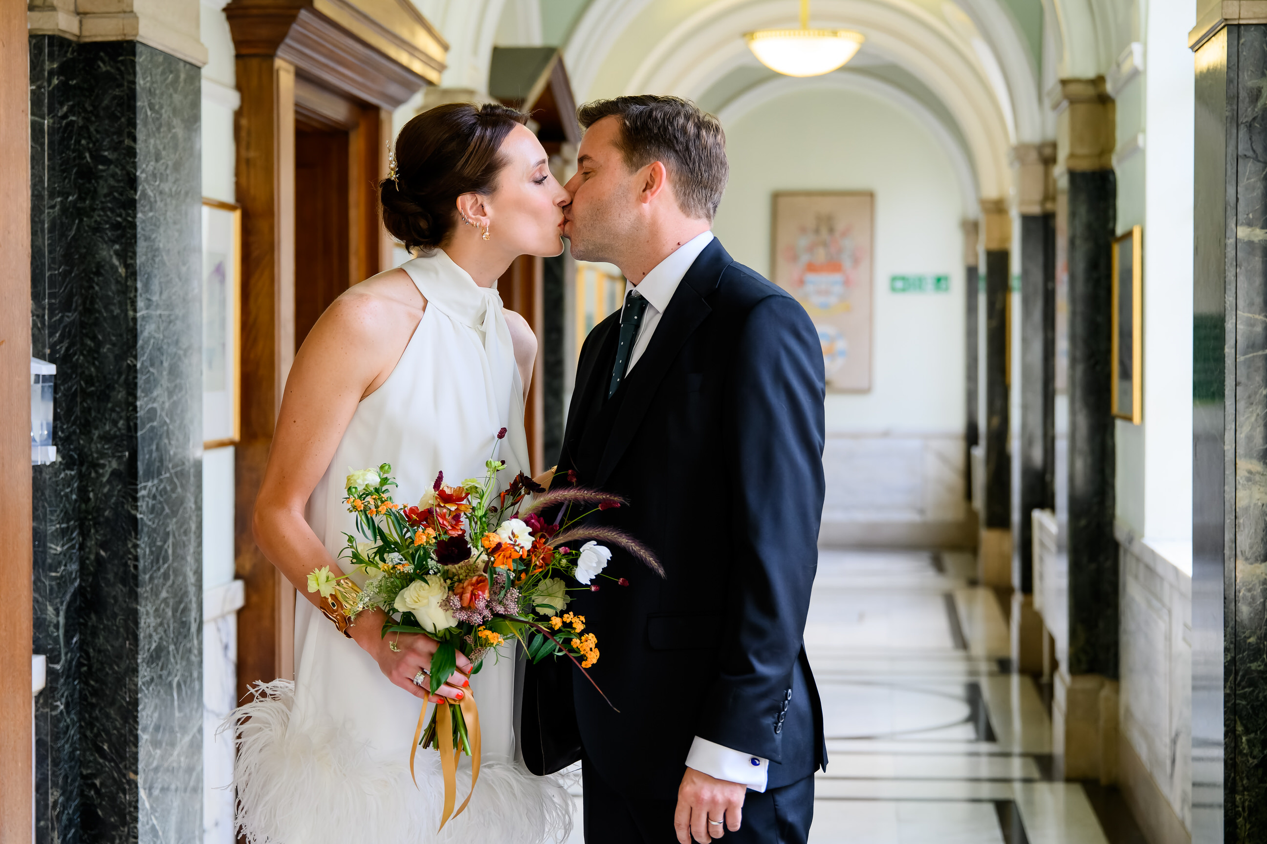 Bride and groom kissing during couples photo session at Islington Town Hall Wedding