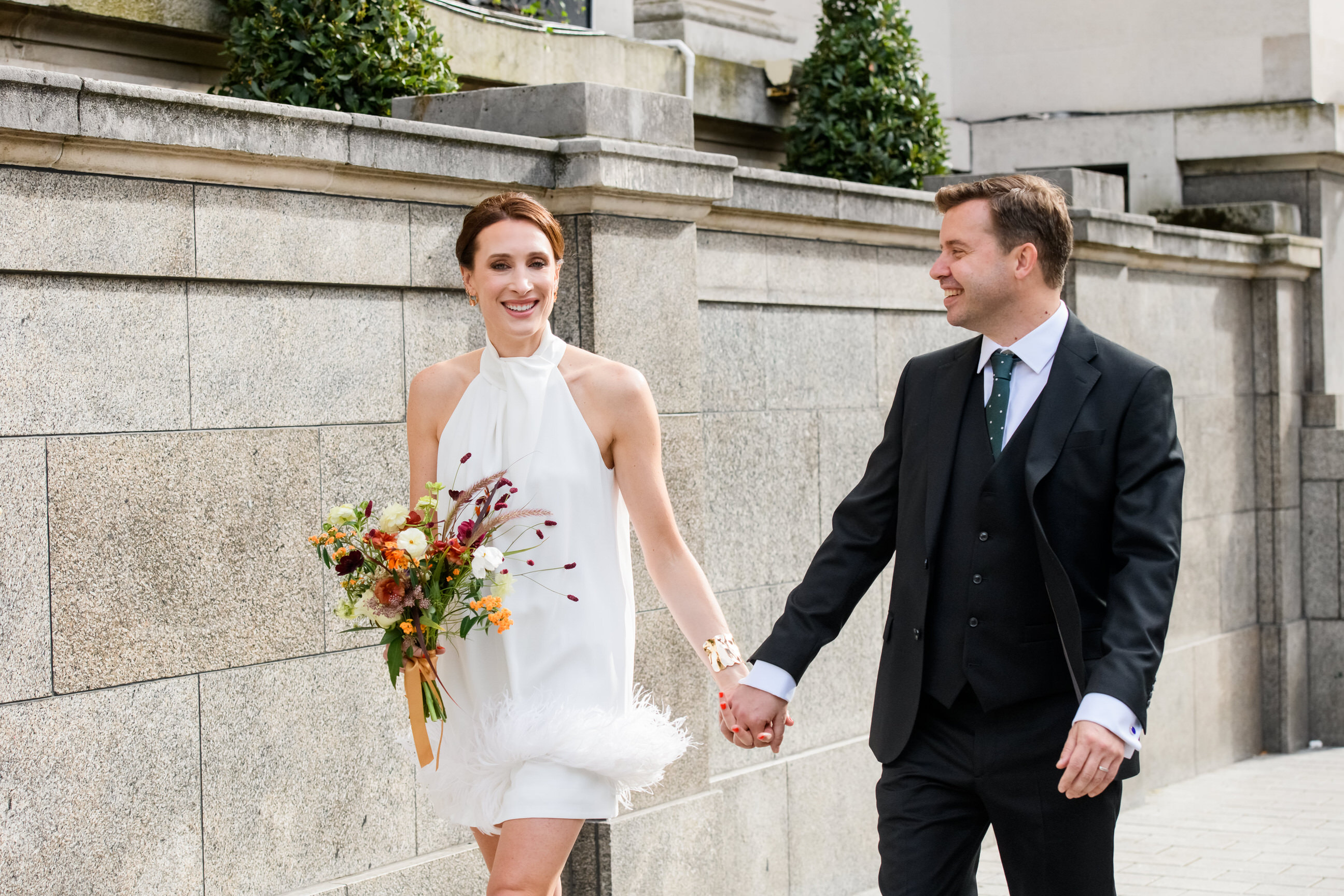 wedding couple smiling at each other during Islington Town Hall wedding photography