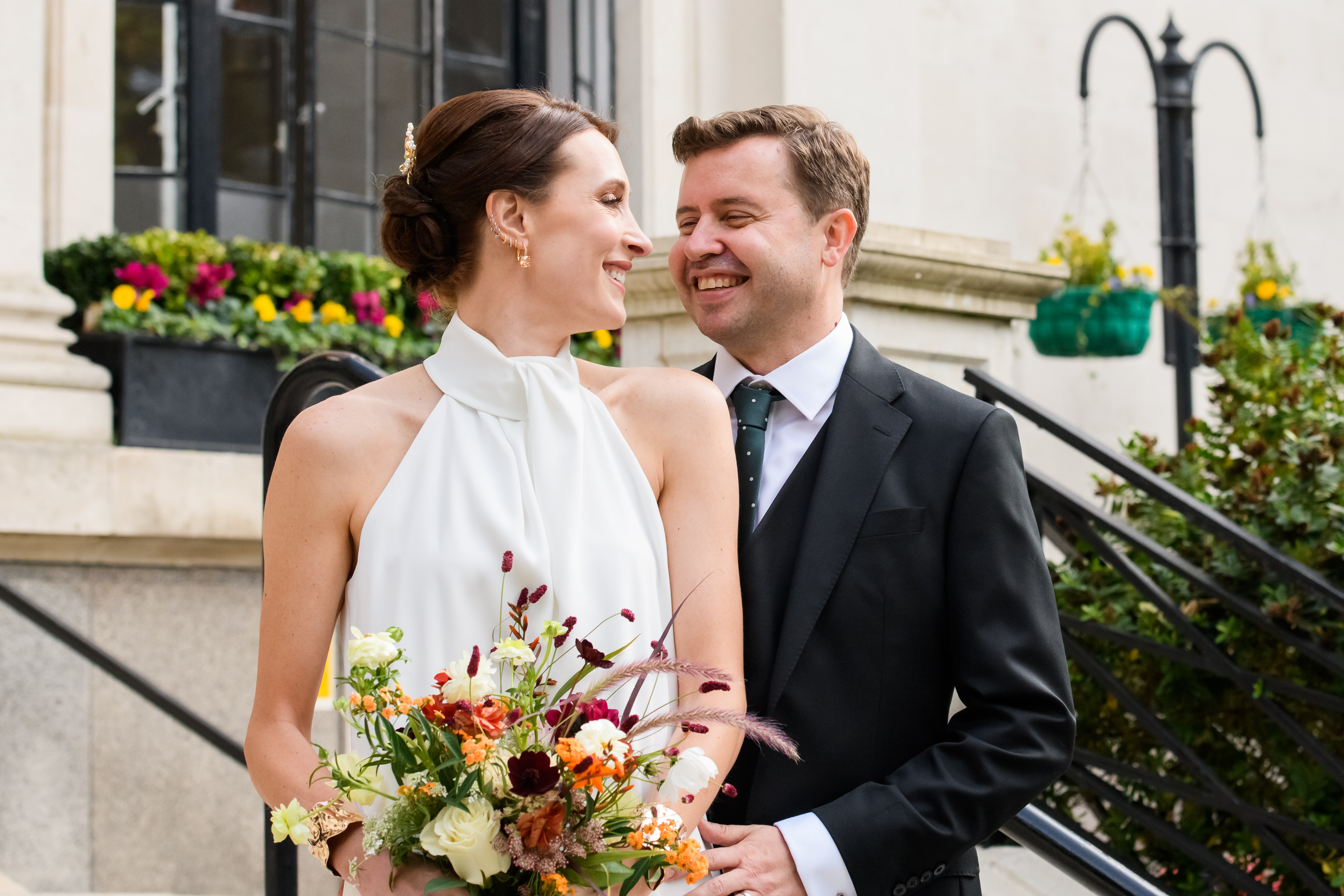 cool wedding couple laughing during Islington Town Hall wedding photography