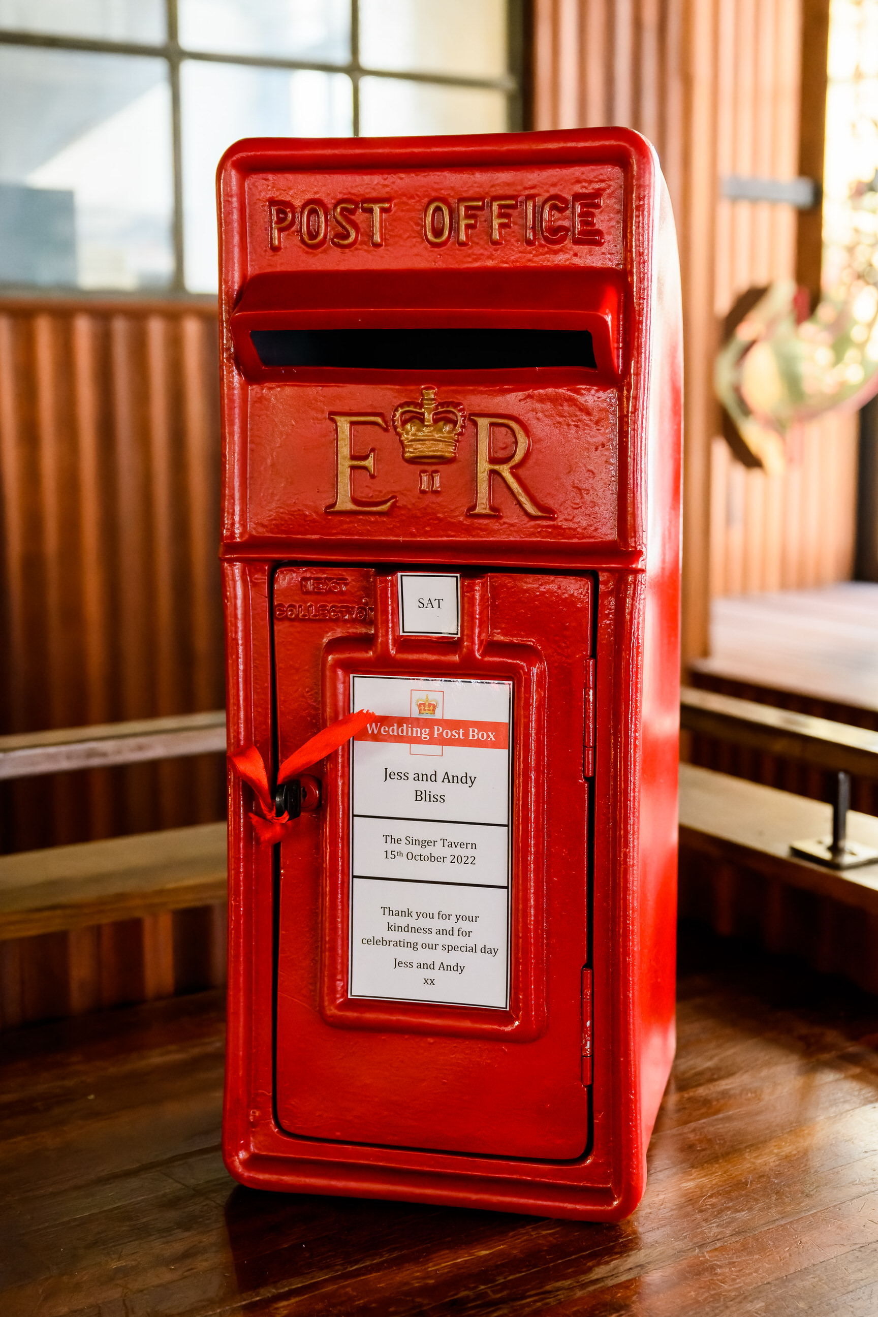 red wedding post box at london pub wedding
