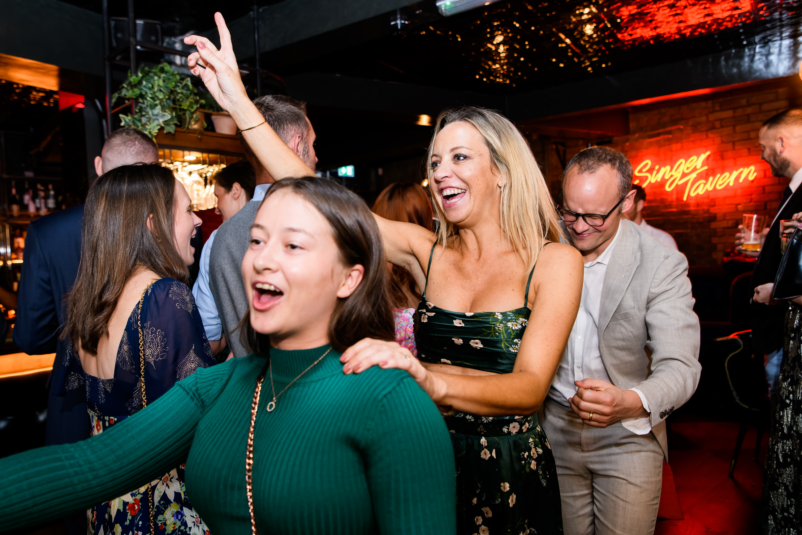 Wedding guests dancing and having fun in the Singer Tavern Basement
