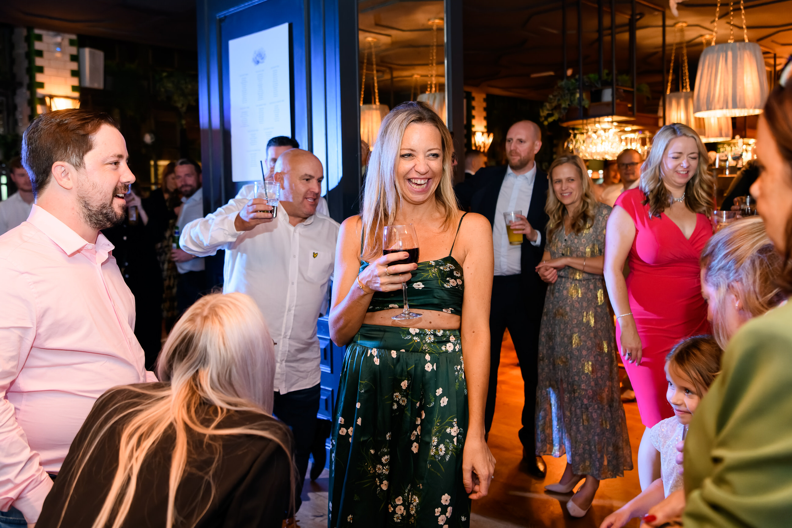 wedding guests dancing and laughing together at The Singer Tavern wedding venue