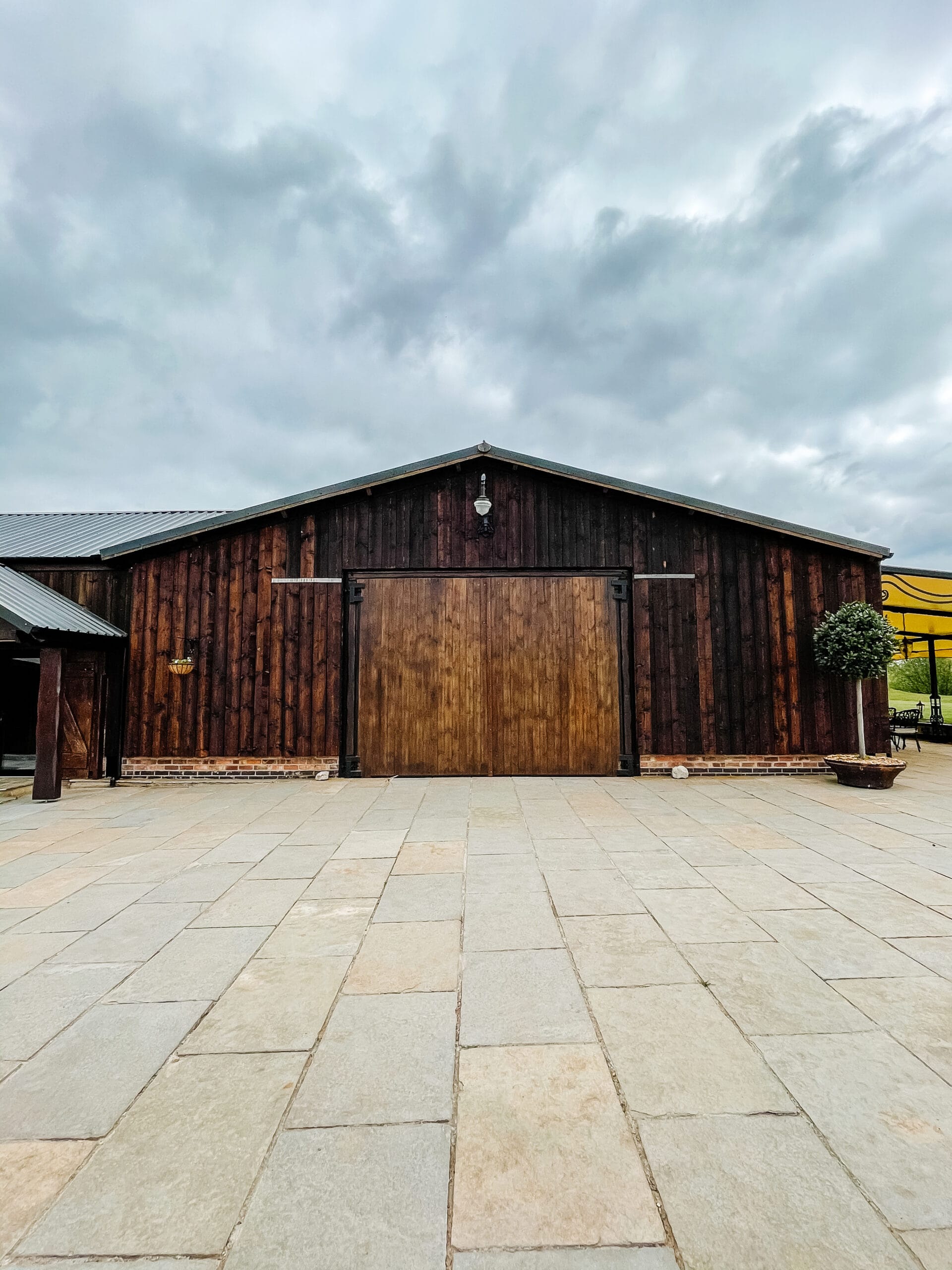 Exterior of the grand barn at Willow Marsh Farm wedding venue in Nottingham