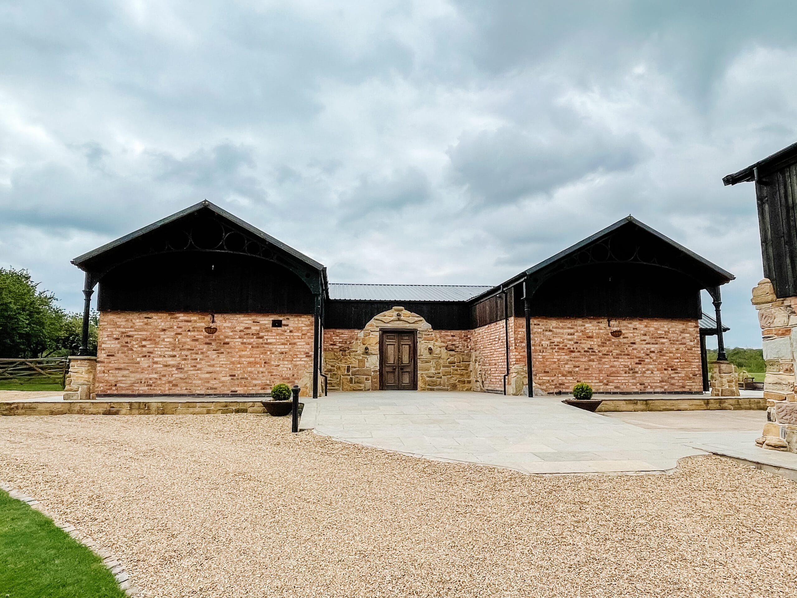 Exterior of the grand barn at Willow Marsh Farm wedding venue