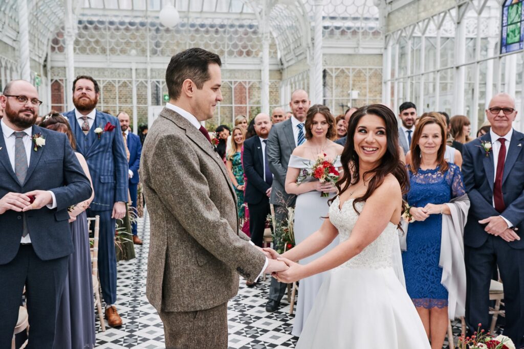 Happy bride and groom during wedding ceremony at The Horniman Museum
