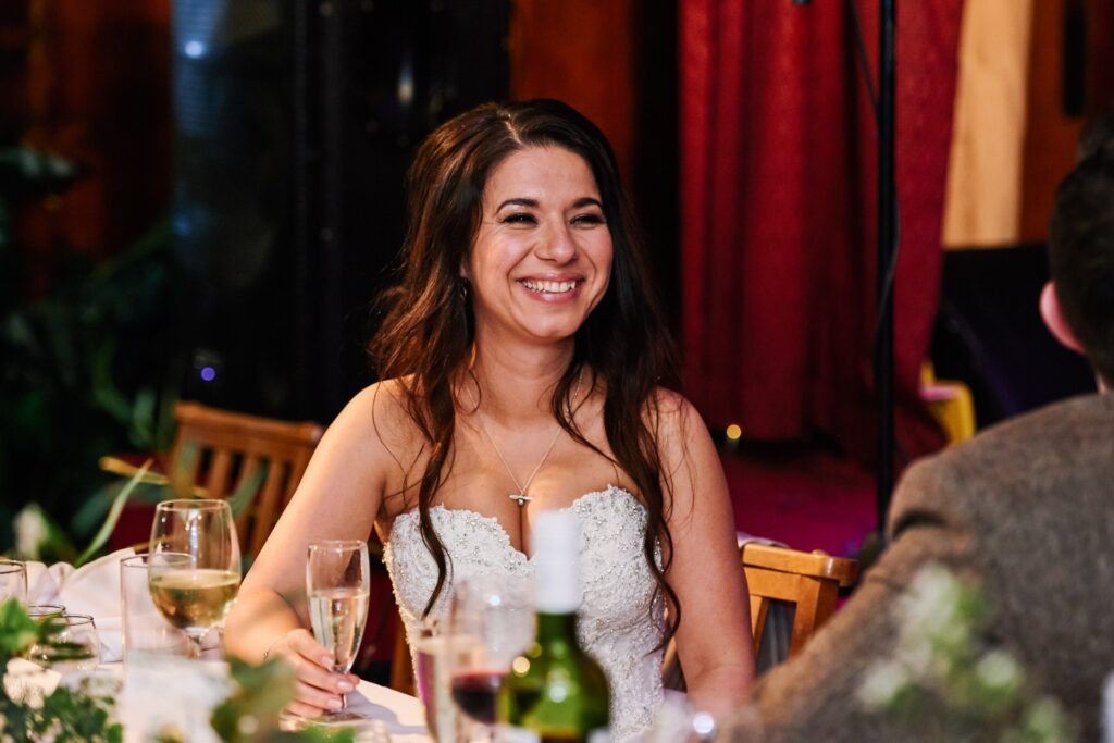bride laughing during speeches at Ivy House pub wedding