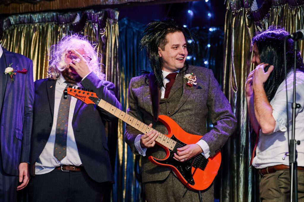 groom & wedding guests doing a comedy performance at The Ivy House Pub 